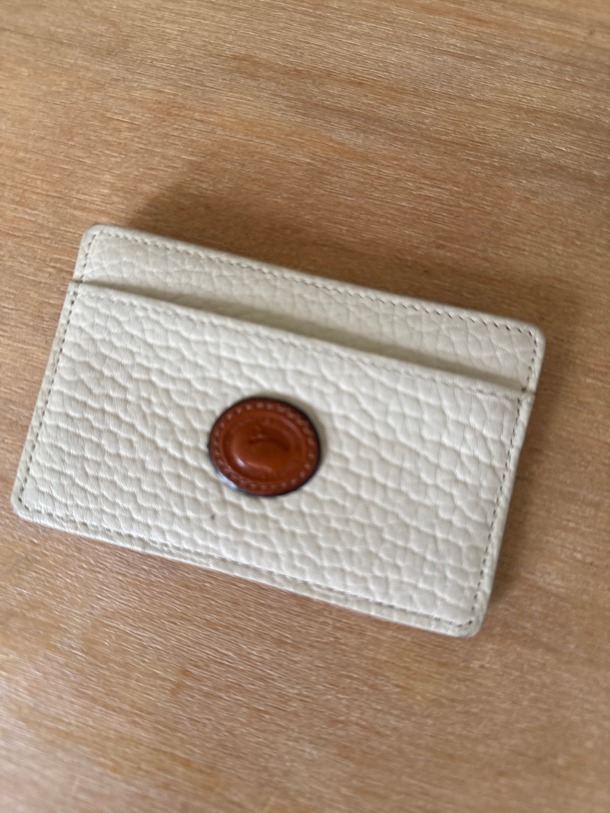 Dooney And Bourke Card Holder Cream Leather Brown Leather Logo Crest